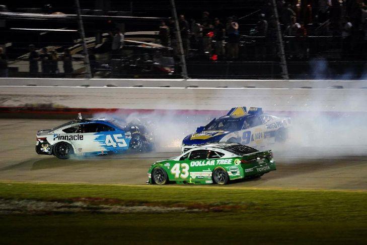 Tyler Reddick (45) and Chase Elliott (9) wreck on the final lap as